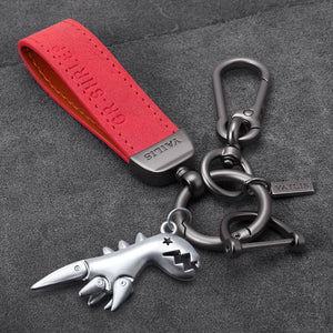 Daim rouge + taille pendante + dinosaure argenté